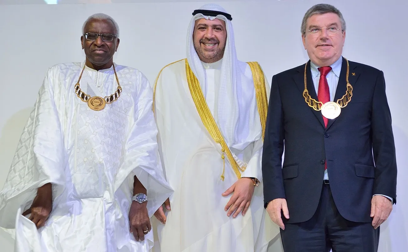 Olympic family: Long-time allies Lamine Diack (convicted), Sheikh Ahmad (convicted), Thomas Bach. (Photo: ANOC)